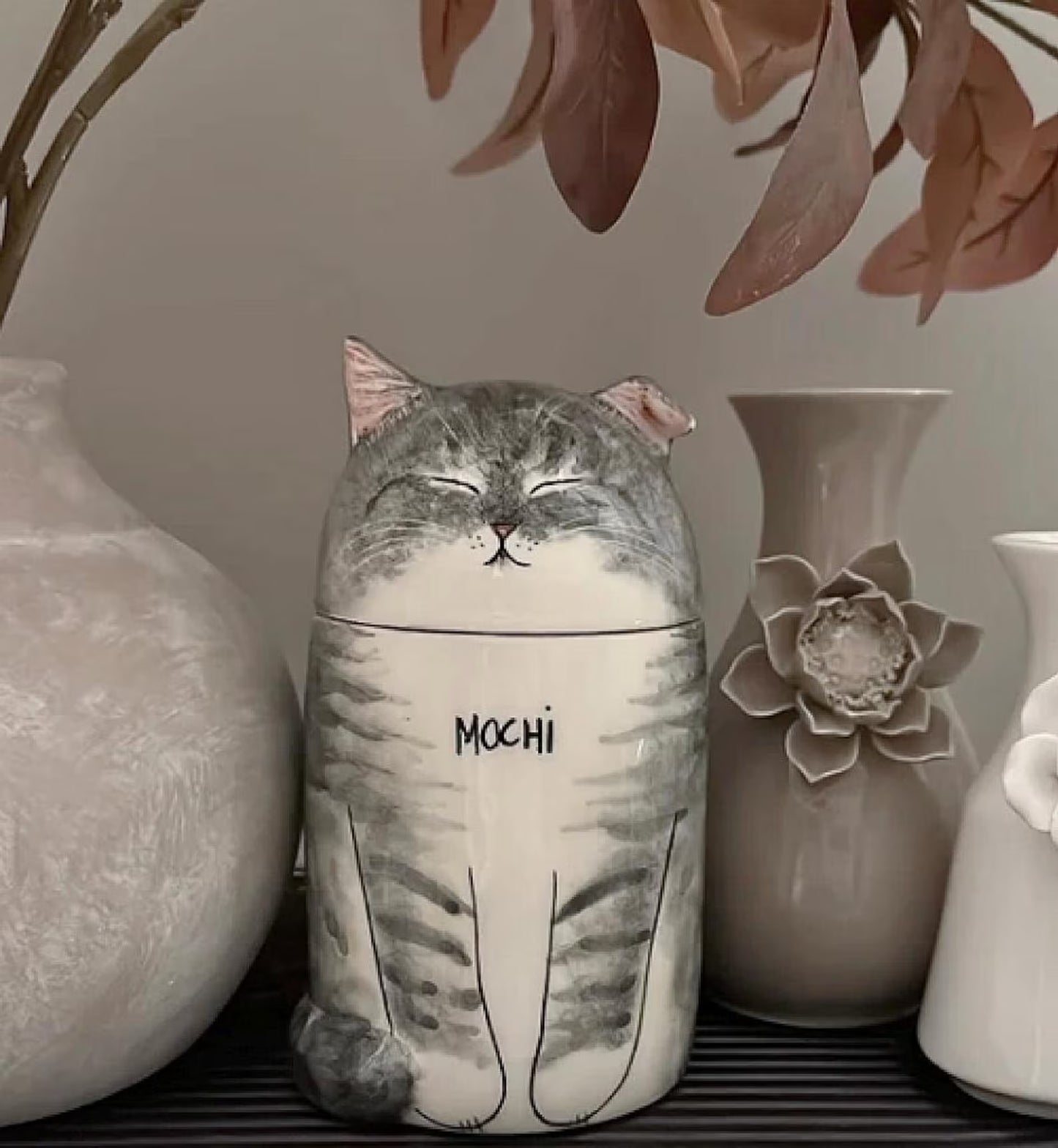 Handcrafted cat cremation urn – open-eye design memorial